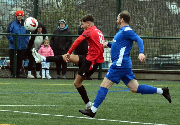 Jamie Wilkes lobbed the keeper for the opener for Pennar Robins. Picture Gordon Thomas